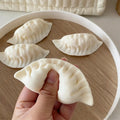 Realistic Dumpling Squishy — Bag Charm & Desk Toy