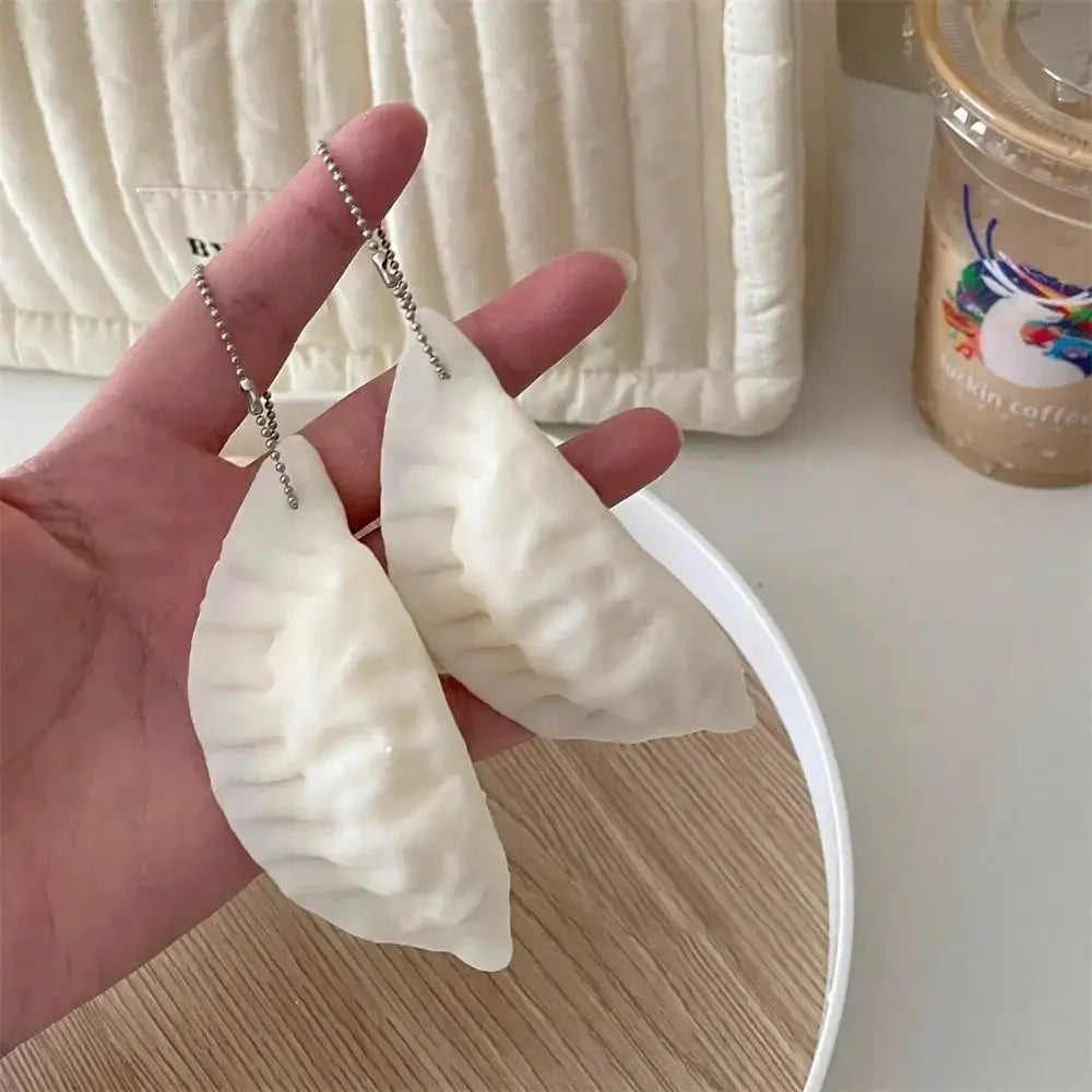 Realistic Dumpling Squishy — Bag Charm & Desk Toy